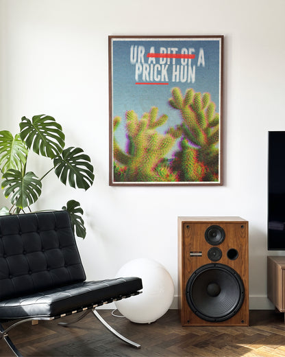 Bit of a Prick funny cactus quote poster in a walnut frame on a wall