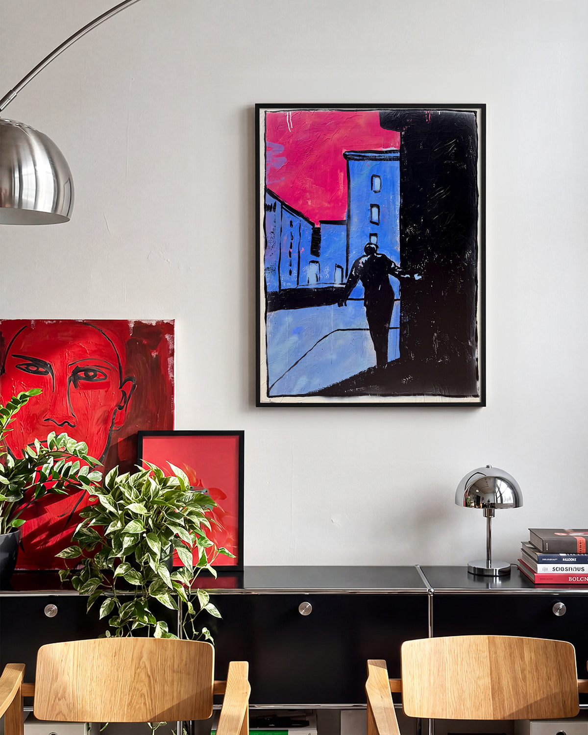 7953 abstract figurative painting print in a black frame on a wall