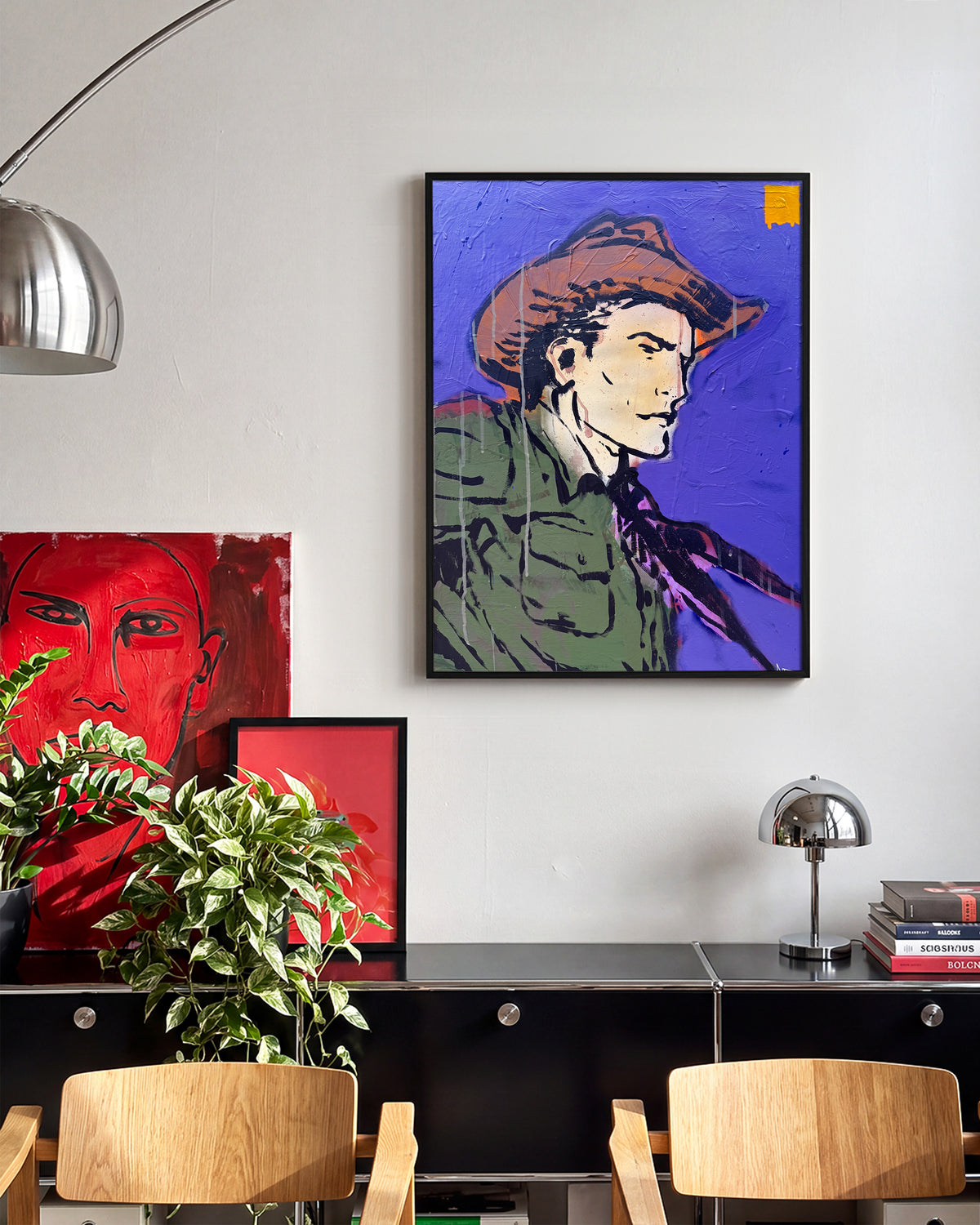 Locked & Loaded 2 pop art painting print in a black frame on a wall