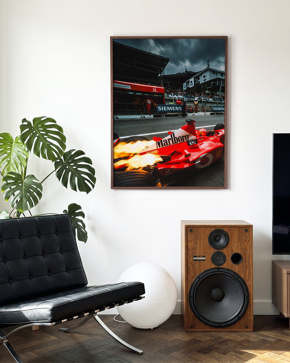 Ferrari Fire vintage Ferrari racing poster in a walnut frame on a wall