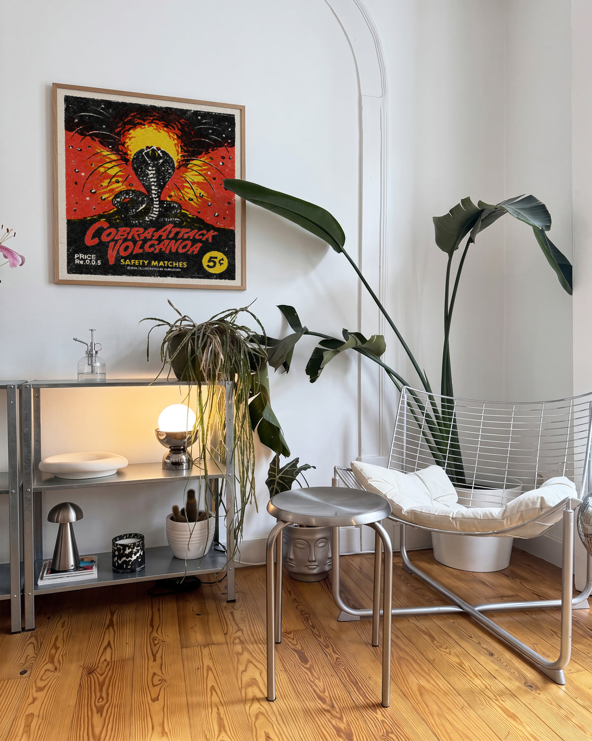 Cobra Attack Volcanoa vintage cobra tattoo print in an oak frame on a wall