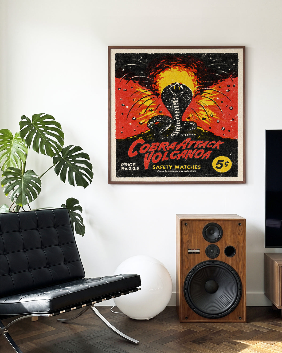 Cobra Attack Volcanoa vintage cobra tattoo print in a walnut frame on a wall