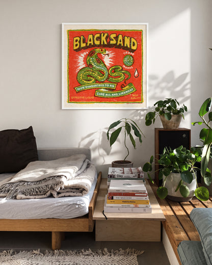Black Sand Cobra vintage cobra tattoo print in a white frame on a wall