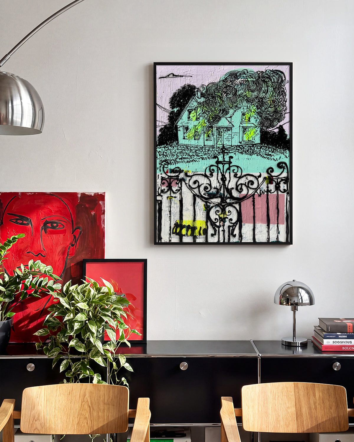 Broken pop art comic collage print in a black frame, in a room setting