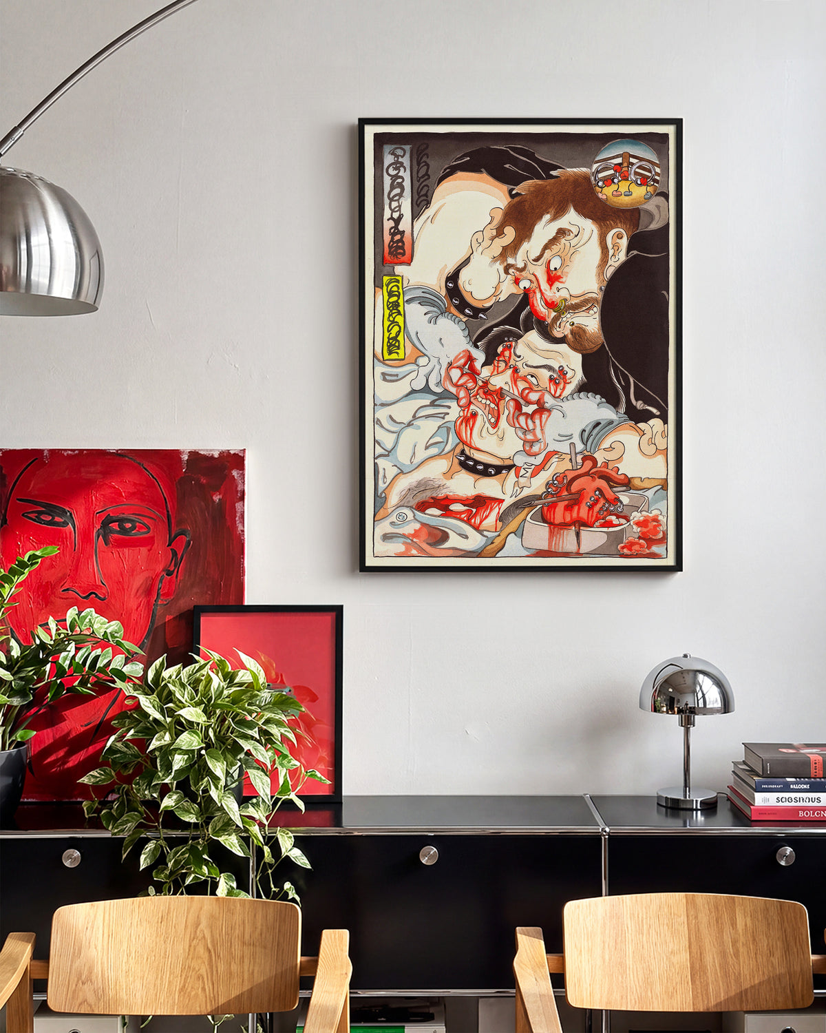 A Feast of Mischief Japanese tattoo art print in a black frame, in a room setting