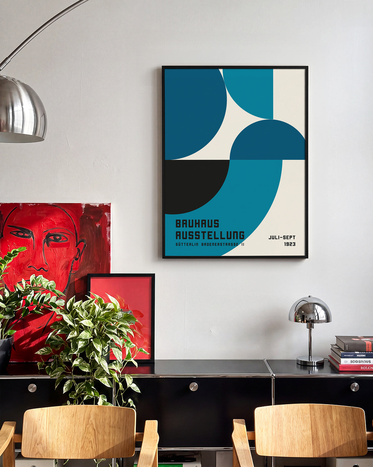 Bauhaus geometric art poster in a black frame on a room wall
