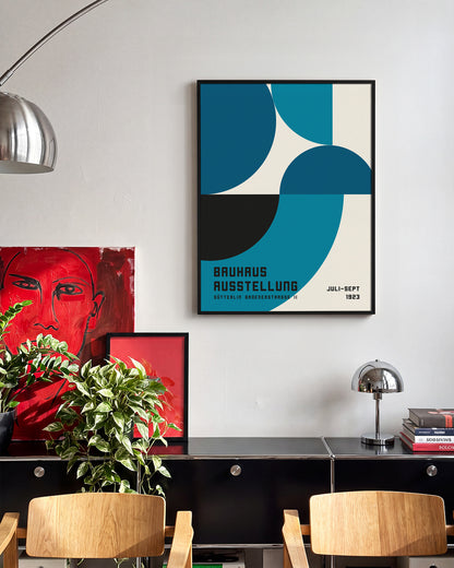 Bauhaus geometric art poster in a black frame on a room wall
