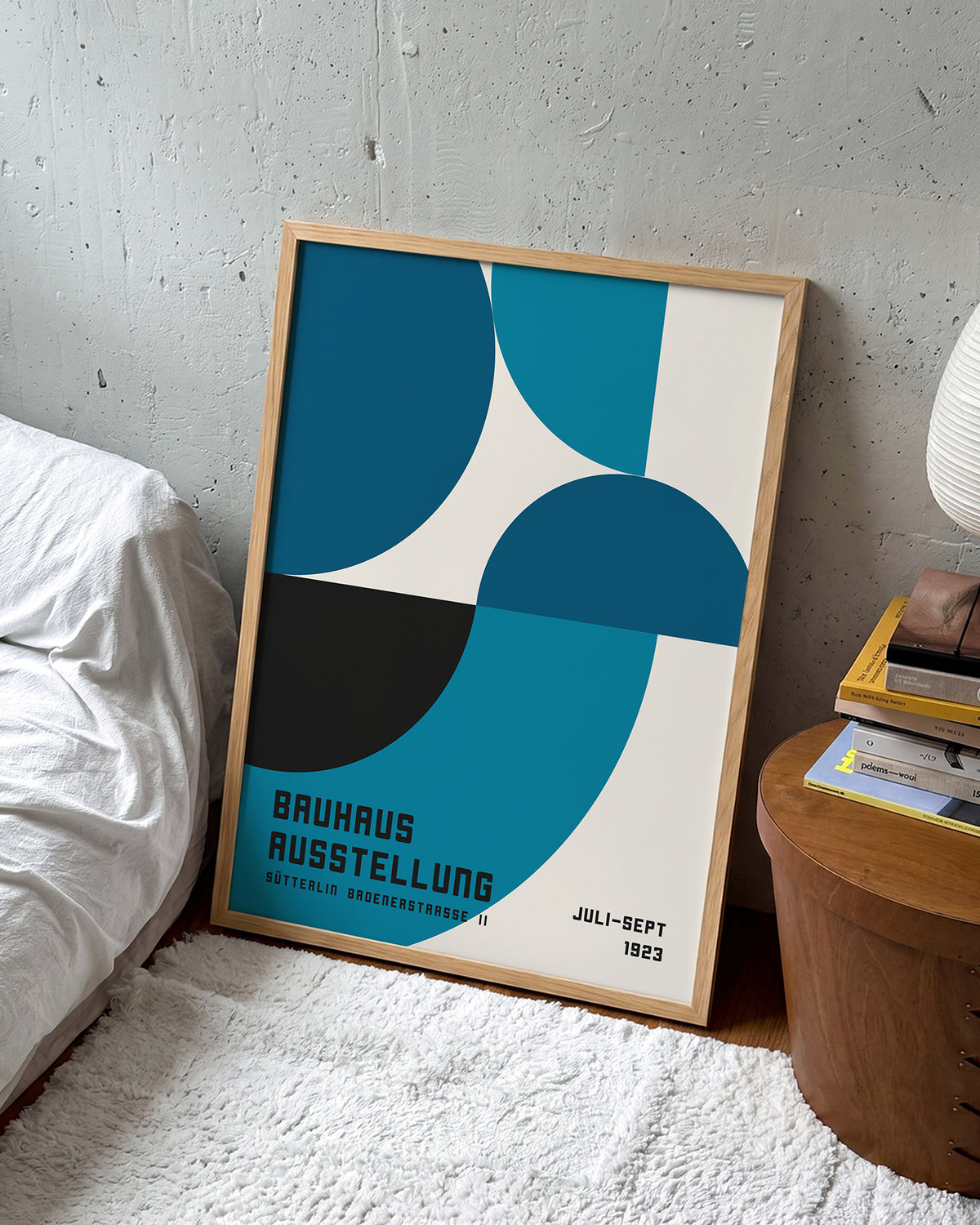 Bauhaus geometric art poster in an oak frame on a room wall