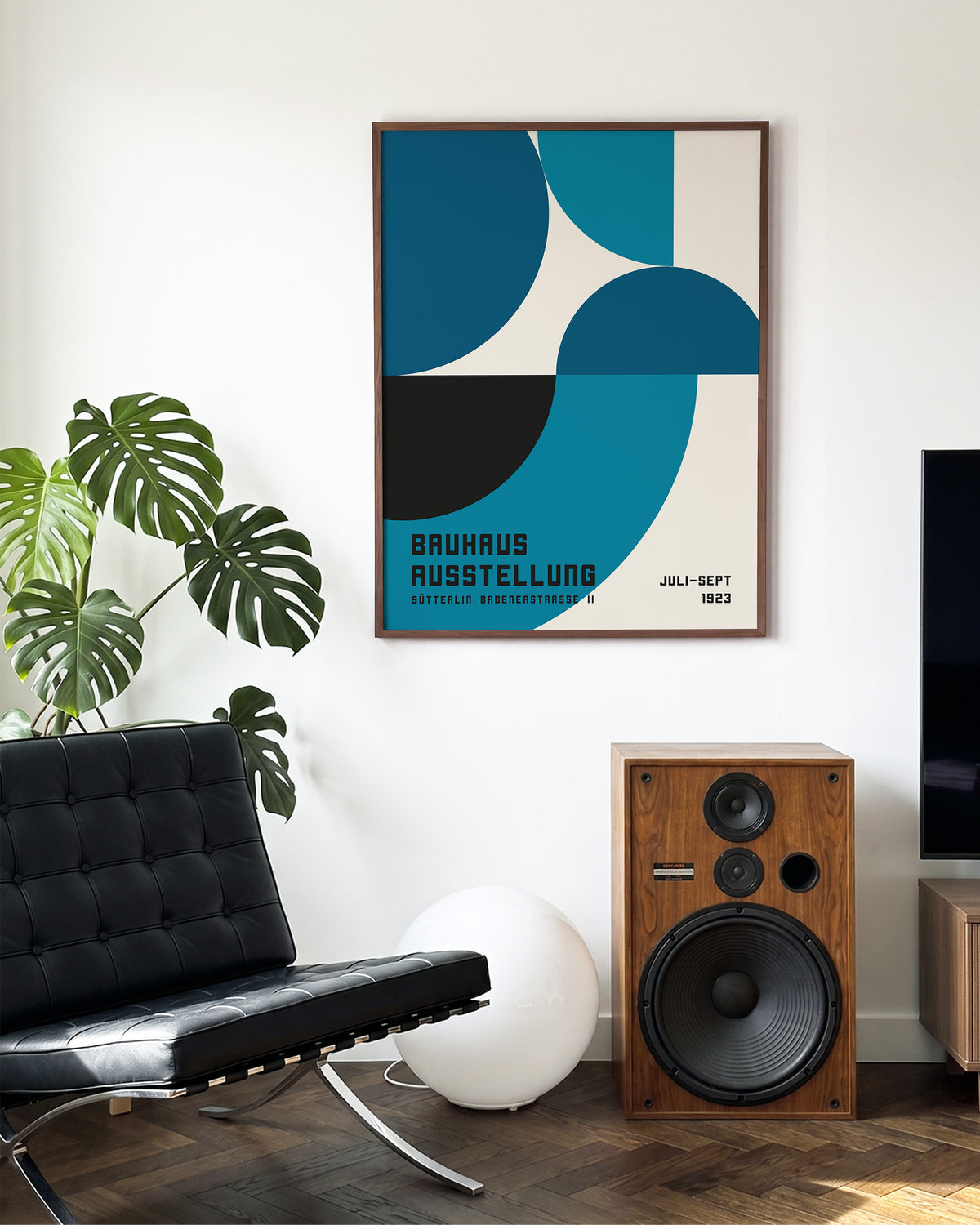 Bauhaus geometric art poster in a walnut frame on a room wall