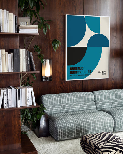 Bauhaus geometric art poster in a white frame on a room wall