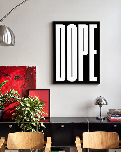 Dope typography poster in a black frame on a room wall