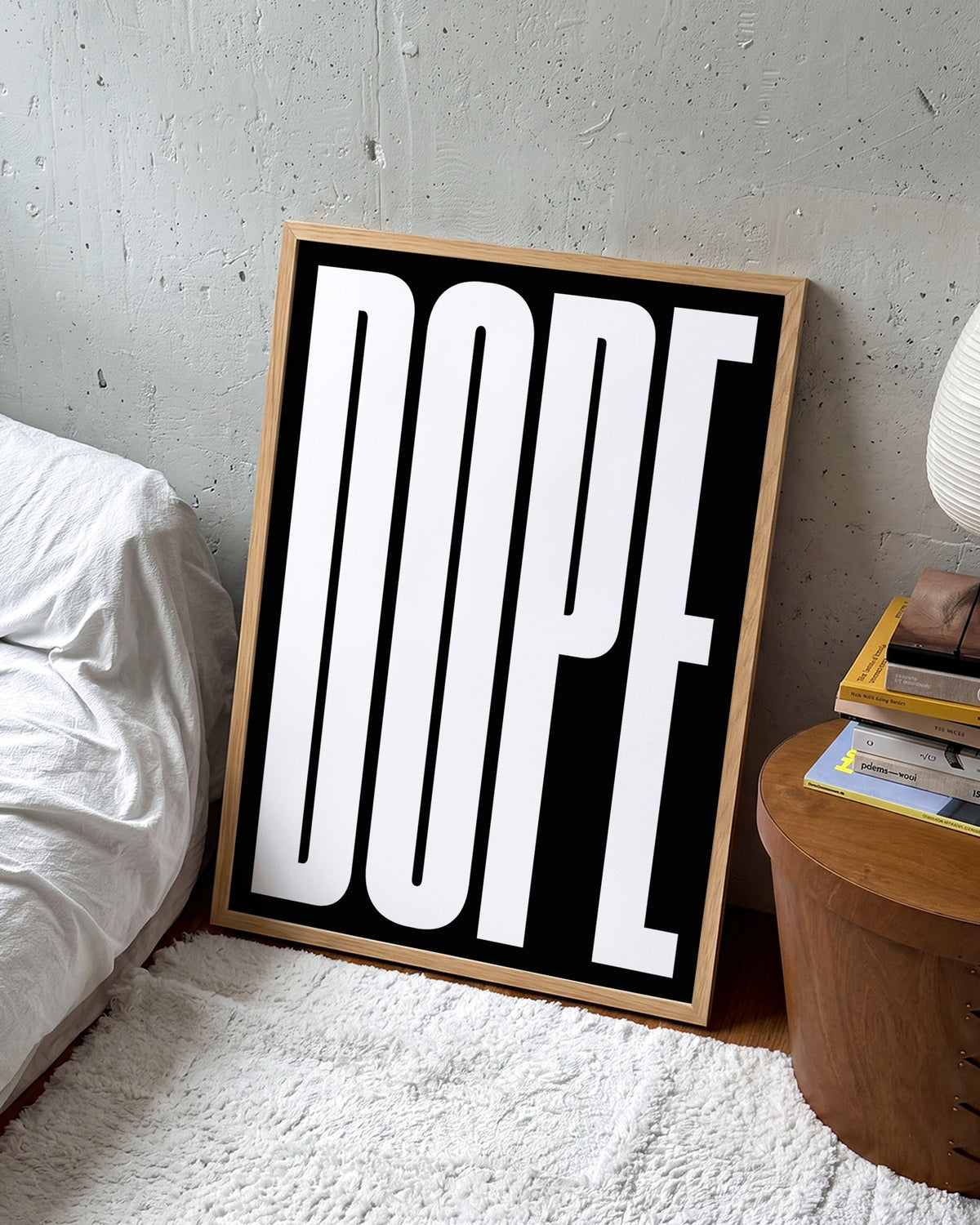 Dope typography poster in an oak frame on a room wall