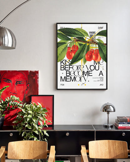 Kiss Me romantic quote poster in a black frame on a room wall